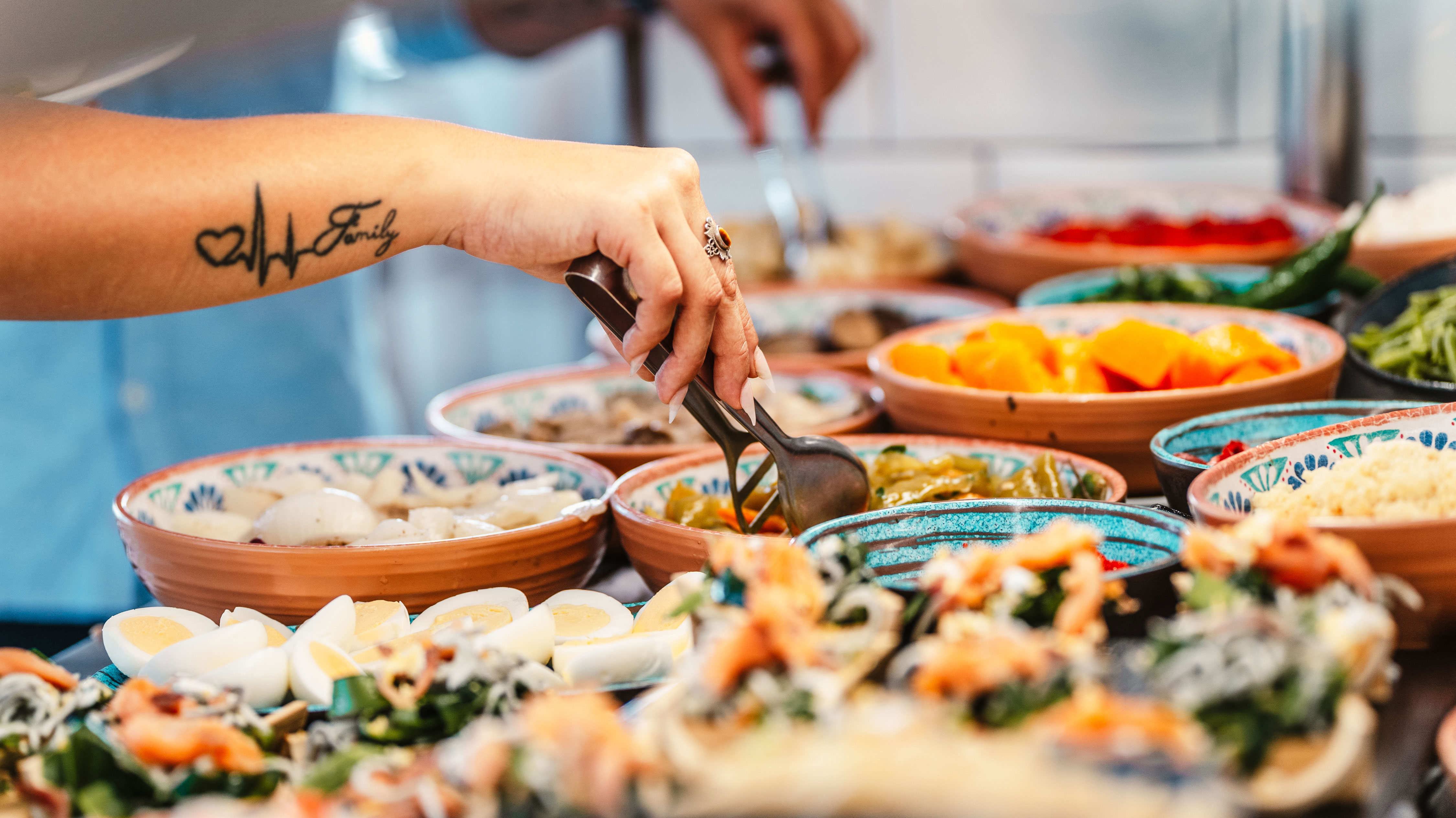 Dining table setup in Buffet Restaurant at Alyssa Suite Hotel